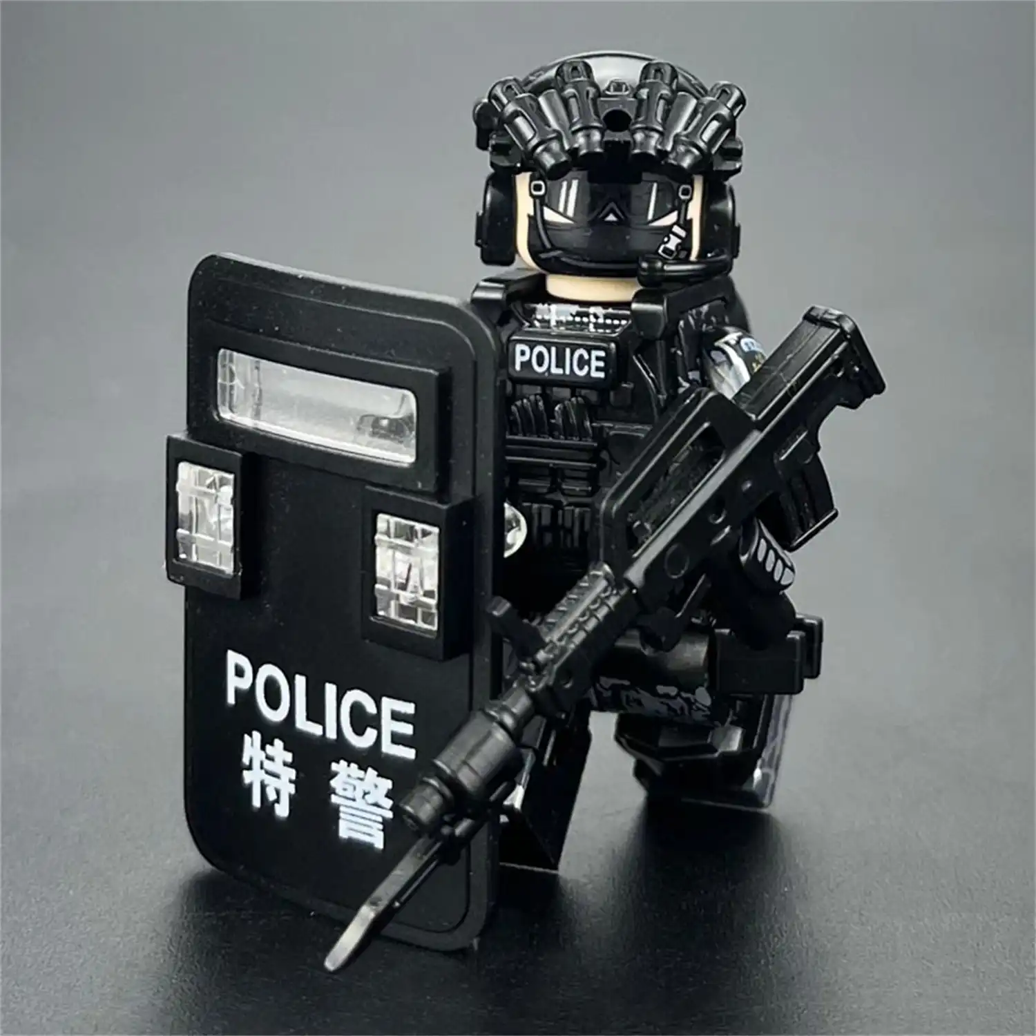 Minifigure - Chinese Special Police officer equipped with a riot shield and a Type 95 rifle (LEGO Alternative) Minifigure - Chinese Special Police officer equipped with a riot shield and a Type 95 rifle (LEGO Alternative)