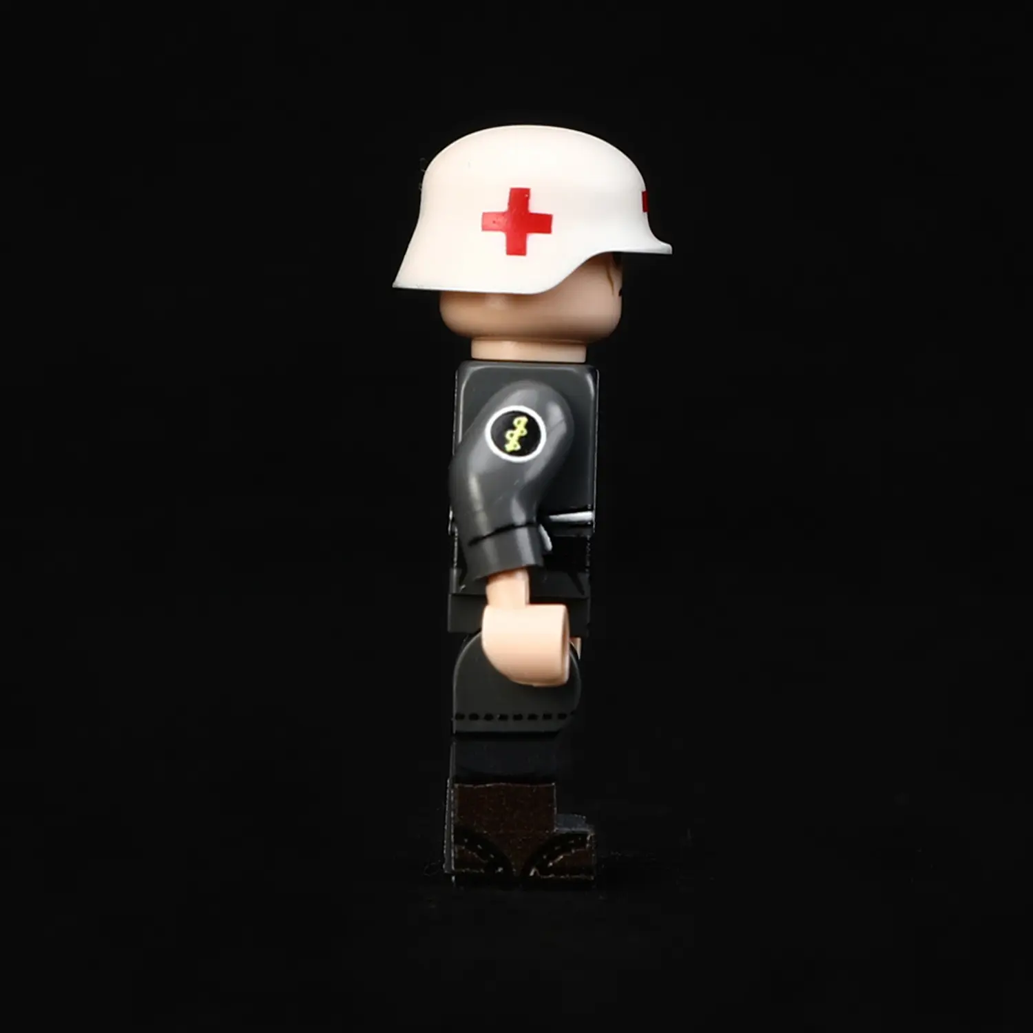 the right side of Minifigure - German combat medic (Sanitäter) World War II (LEGO Compatible) German combat medics (Sanitäter) equipped to act as stretcher-bearers (Krankenträger) World War II - Custom Printed Brick Block Figure