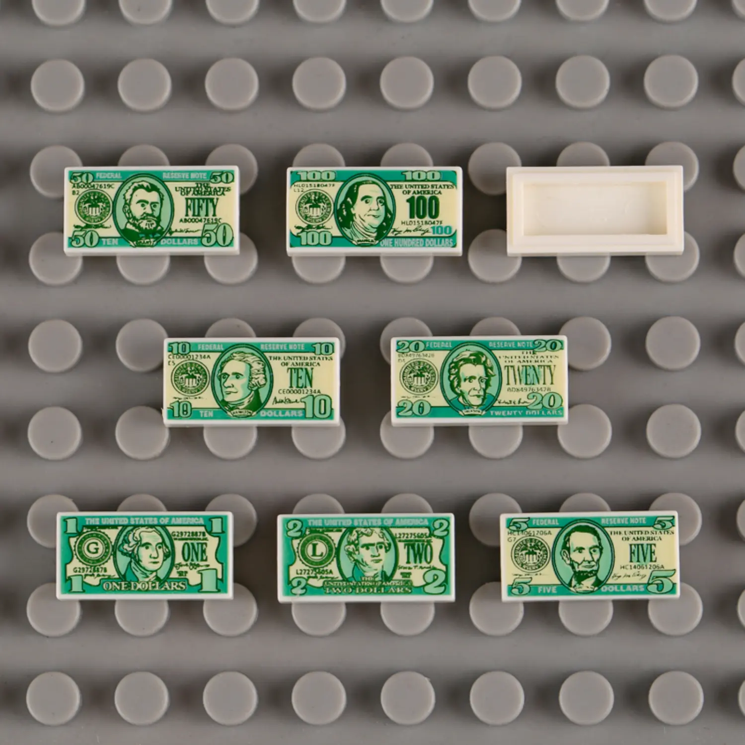 Custom Piece Miniature – United States dollar bills in various denominations custom-printed tile – 3D Print for LEGO minifigure on the LEGO baseplate Custom Piece Miniature – United States dollar bills in various denominations custom-printed tile – 3D Print for LEGO minifigure on the LEGO baseplate