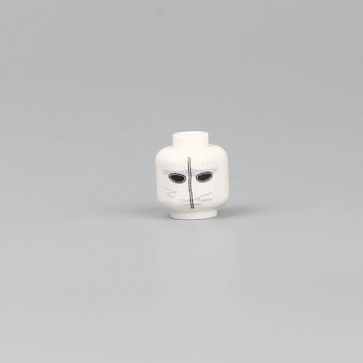the head of the Minifigure - German Sniper Winter Soldier equipped for cold-weather combat during World War II (LEGO Compatible) the head of the Minifigure - German Sniper Winter Soldier equipped for cold-weather combat during World War II (LEGO Compatible)