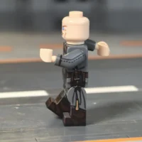 the left left side of the Minifigure - German Infantryman (Veteran NCO) WWII (LEGO Compatible) Minifigure - German Infantryman (Veteran NCO) WWII (LEGO Compatible)