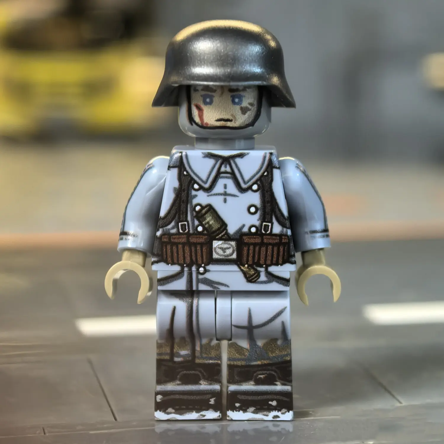 the front of the Minifigure - German Anti-Aircraft Artillery Soldier (Winter) WWII (LEGO Compatible)