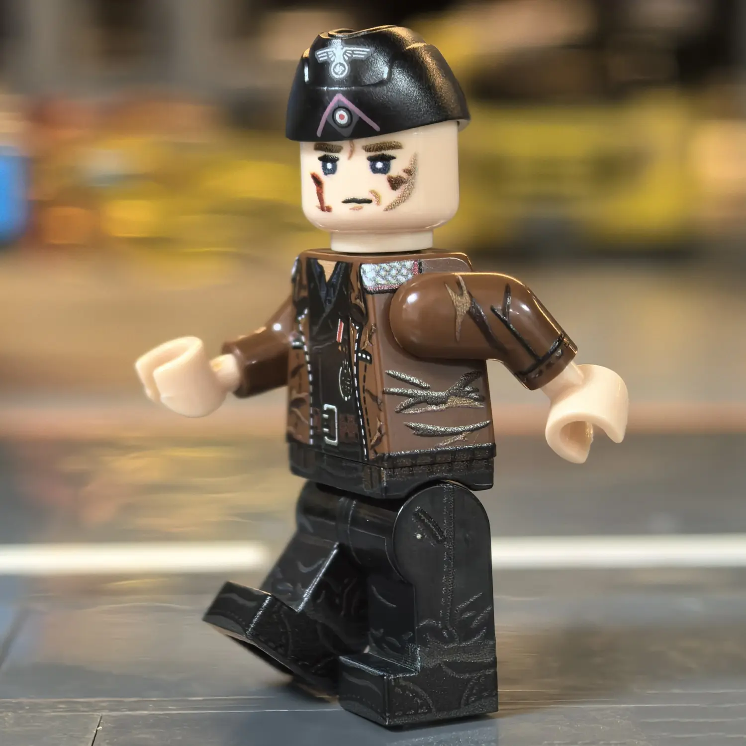 the left side of the Minifigure - German Panzer Commander (Normandy 1944 Hitlerjugend Division Style) WWII (LEGO Compatible) the left side of the Minifigure - German Panzer Commander (Normandy 1944 Hitlerjugend Division Style) WWII (LEGO Compatible)