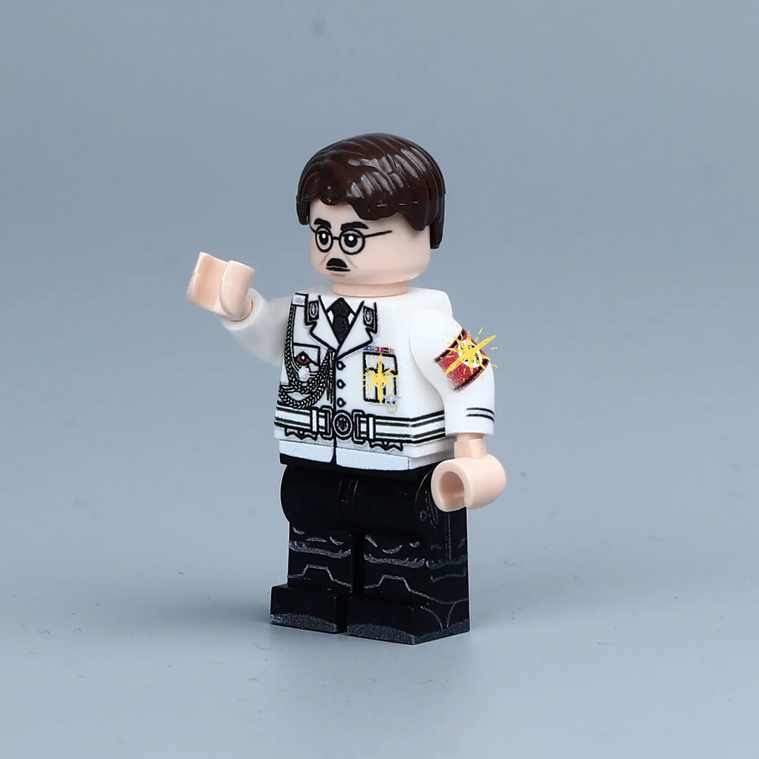 the left side of the Minifigure - Heinrich Himmler (Reichsführer-SS Head of the SS) (LEGO Compatible) the left side of the Minifigure - Heinrich Himmler (Reichsführer-SS Head of the SS) (LEGO Compatible)