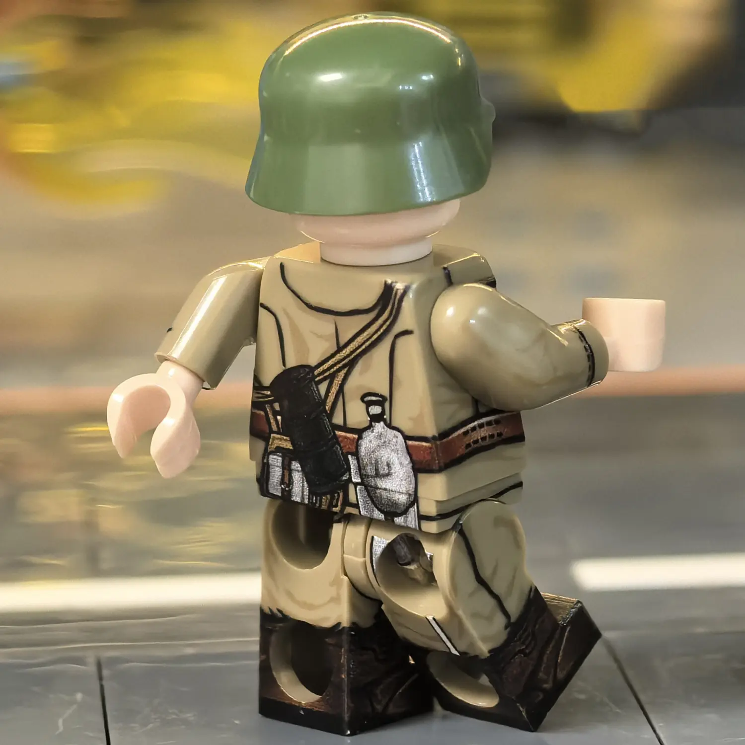 the back of the Minifigure - Royal Hungarian Honvéd Infantryman, specifically a Non-Commissioned Officer (NCO) wearing the M43 Field Uniform WWII (LEGO Compatible) Royal Hungarian Honvéd Infantryman, specifically a Non-Commissioned Officer (NCO) wearing the M43 Field Uniform WWII - Custom Printed Brick Block Figure