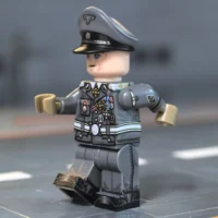 the left side of the Minifigure - German SS-Standartenführer (Cinematic Inglourious Basterds Colonel) WWII (LEGO Compatible) German Hans Landa SS-Standartenführer (Cinematic “Inglourious Basterds” Colonel) WWII - Custom Printed Brick Block Figure