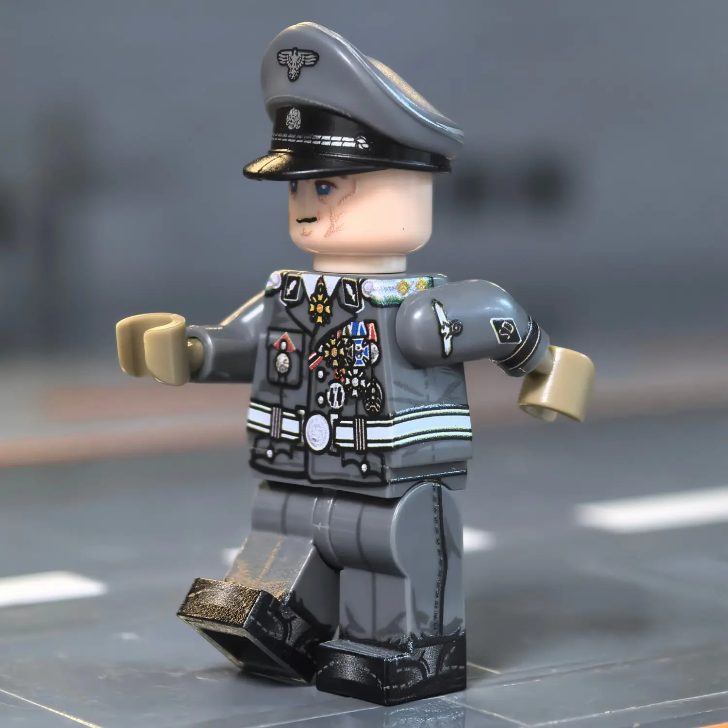 the left side of the Minifigure - German SS-Standartenführer (Cinematic Inglourious Basterds Colonel) WWII (LEGO Compatible) German Hans Landa SS-Standartenführer (Cinematic “Inglourious Basterds” Colonel) WWII - Custom Printed Brick Block Figure