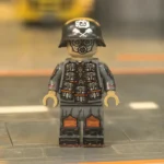 German Assault Grenadier with Gas Mask WWI and dark grey combat helmet modeled after the classic German Stahlhelm 2 - Custom Printed Brick Block Figure